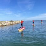 Folk ude på havet på SUP